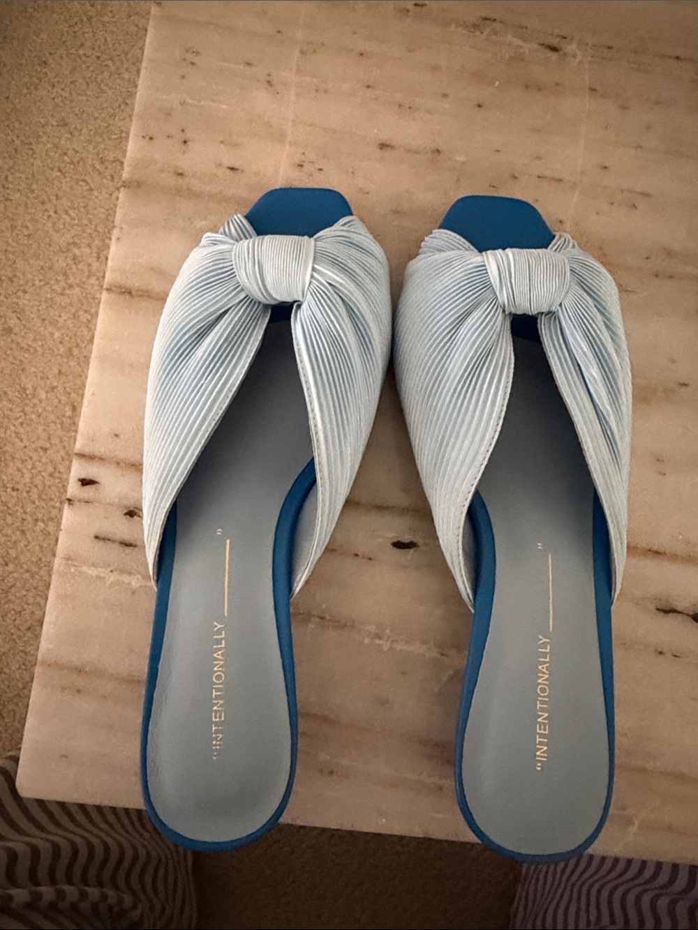 Intentionally blank baby blue kitten heels